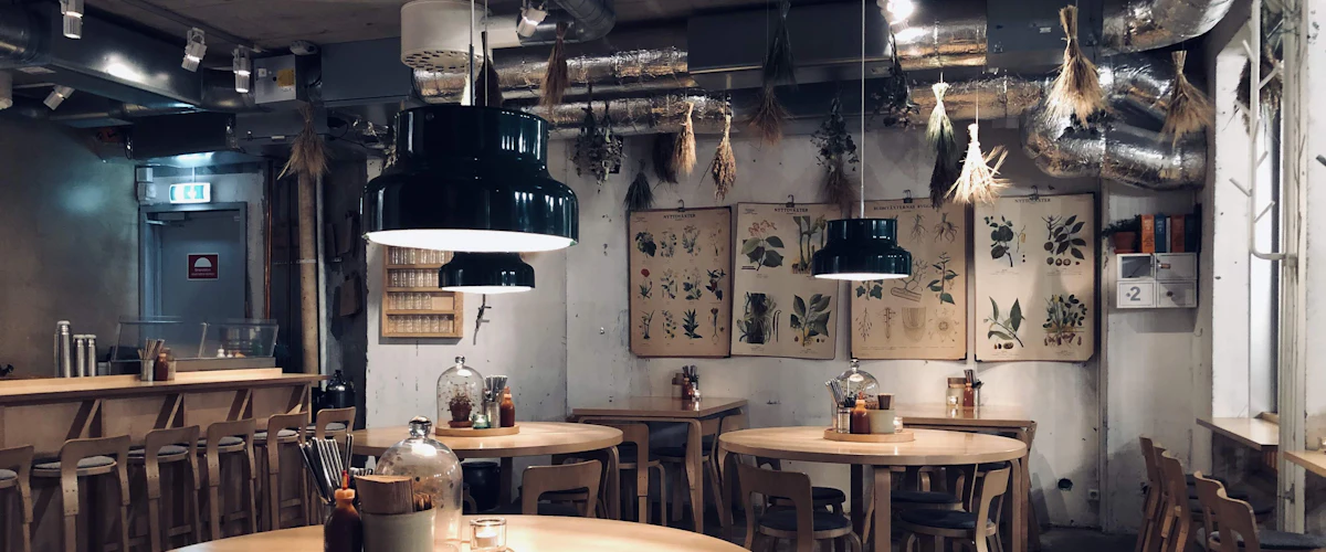 The main dining room, wood and warm light